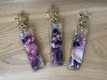 Load image into Gallery viewer, Xavier Fallen Crown Acrylic Charm
